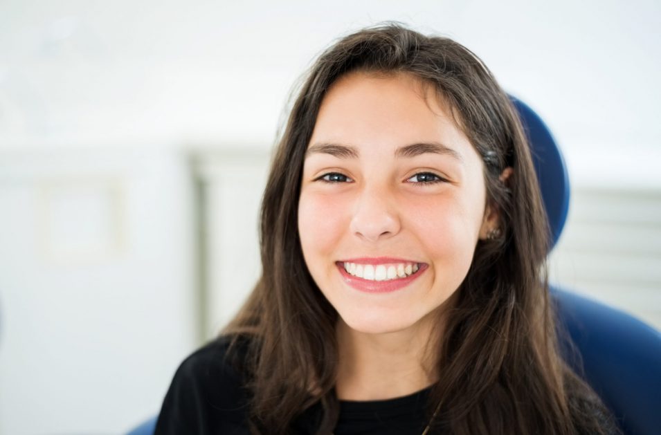 Confident smile after dental treatment dental implants in Brantford Ontario